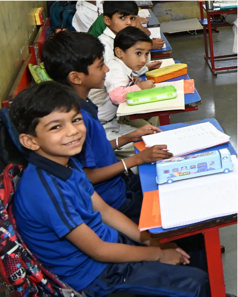 Primary students learning in classroom
